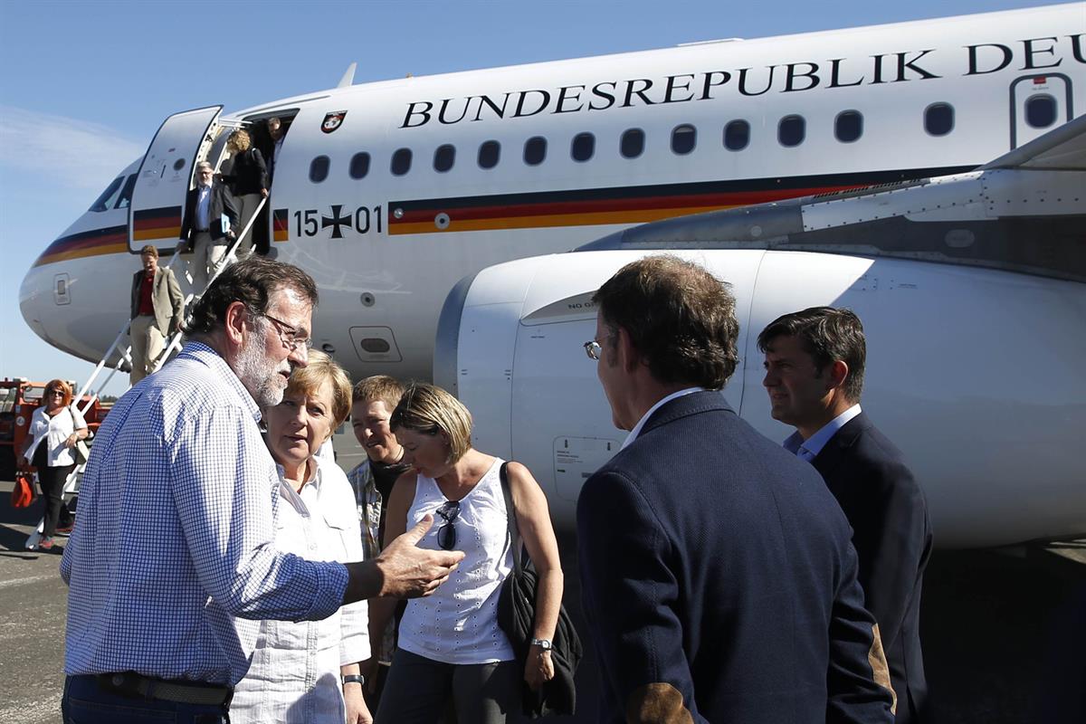 24/08/2014. Rajoy recibe a Merkel en Santiago de Compostela. El presidente del Gobierno, Mariano Rajoy, recibe a la canciller de la Repúblic...